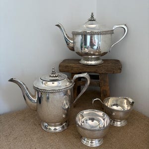 A vintage Viners of Sheffield Alpha Plate silver plated teapot, coffee pot,  lidded  sugar pot and creamer/ jug