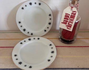 A set of two  Pyrex JAJ Snowflake design 6.5&quot; diameter gold rimmed side tea  plates