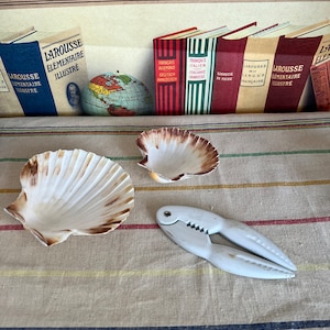 A substantial pair of vintage aluminium  white painted seafood, crab claw, lobster crackers