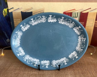 A vintage Chincraft Contracts London blue and white   oval serving plate with a romantic couple border design