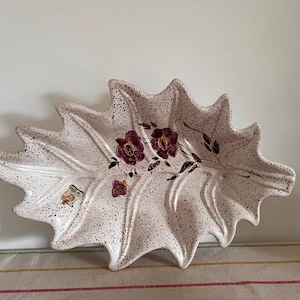 A large Vintage  Vallauris French beige, brown, purple floral decor    leaf shaped glazed ceramic dish for fruit, bread, nuts….