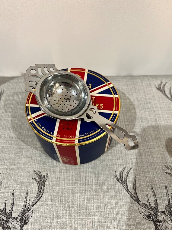 A Retro Nutbrown Made in England Chrome Plated Loose Tea