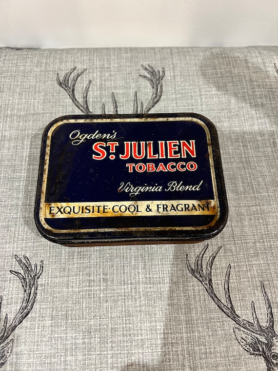 ogdens st julien tobacco tin An Original Ogdens St Julien Tobacco Virginia Blend Two Ounce Tin With a  Push on Lid