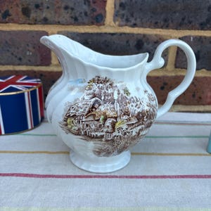 A rare Happy England Series Johnson Bros large fluted  jug in brown and white