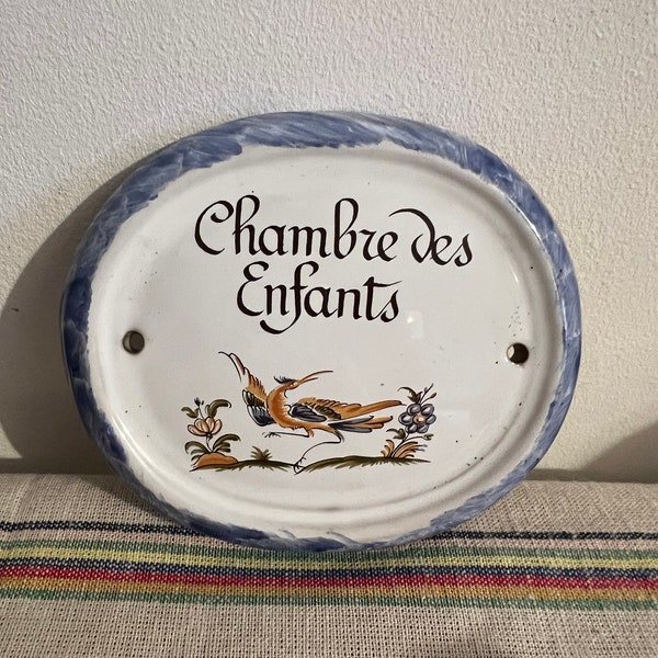 A beautiful  hand painted ceramic Dux Moutiers ' Chambre Des Enfants'  bedroom room door sign with a bird  floral design and blue rim