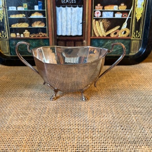 A silver plated vintage, antique footed  EPNS  1147 hard soldered sauce boat with two handles