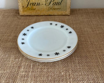 A set of two  Pyrex JAJ Snowflake design 6.5" diameter gold rimmed side tea  plates