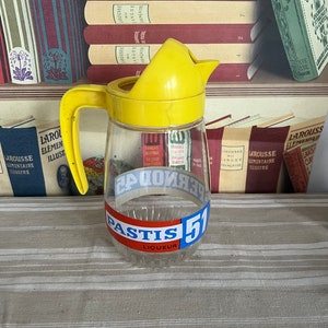 A traditional  retro French Pastis 51 and Pernod 45  Ricard  glass water carafe