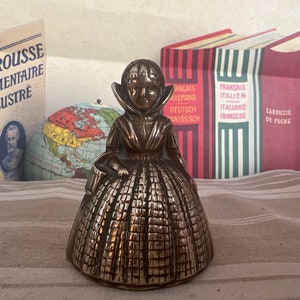 A petit antique vintage brass Victorian  lady crinoline dress hand  ringing bell