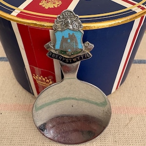 A retro Aberystwyth souvenir loose tea caddy spoon or scoop