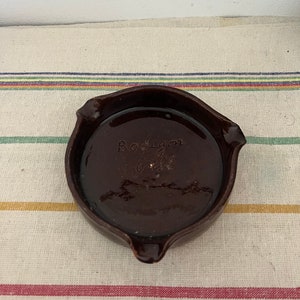 A brown rustic Portuguese Iberican Bodegon Grill ashtray dish for keys, nuts, coins, olives