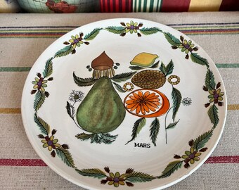 A rare Gien porcelain plate from the 12 Mois de L'annee collection - March design