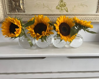 A dramatic, effective quintessential centrepiece  bubble caterpillar vase that can be used with any flower imaginable.