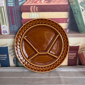 A French vintage Sarreguemines style  caramel brown fondue or raclette accompaniment plate for dips and sauces