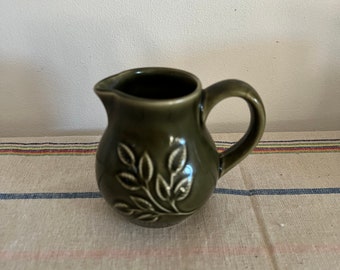 A  gorgeous vintage Holkham  N40  dark olive green glazed pottery small mint sauce  jug or creamer