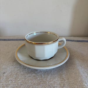 A vintage French Apilco Bistro  standard size  white gold rimmed  3.25&quot; diameter coffee cup and saucer