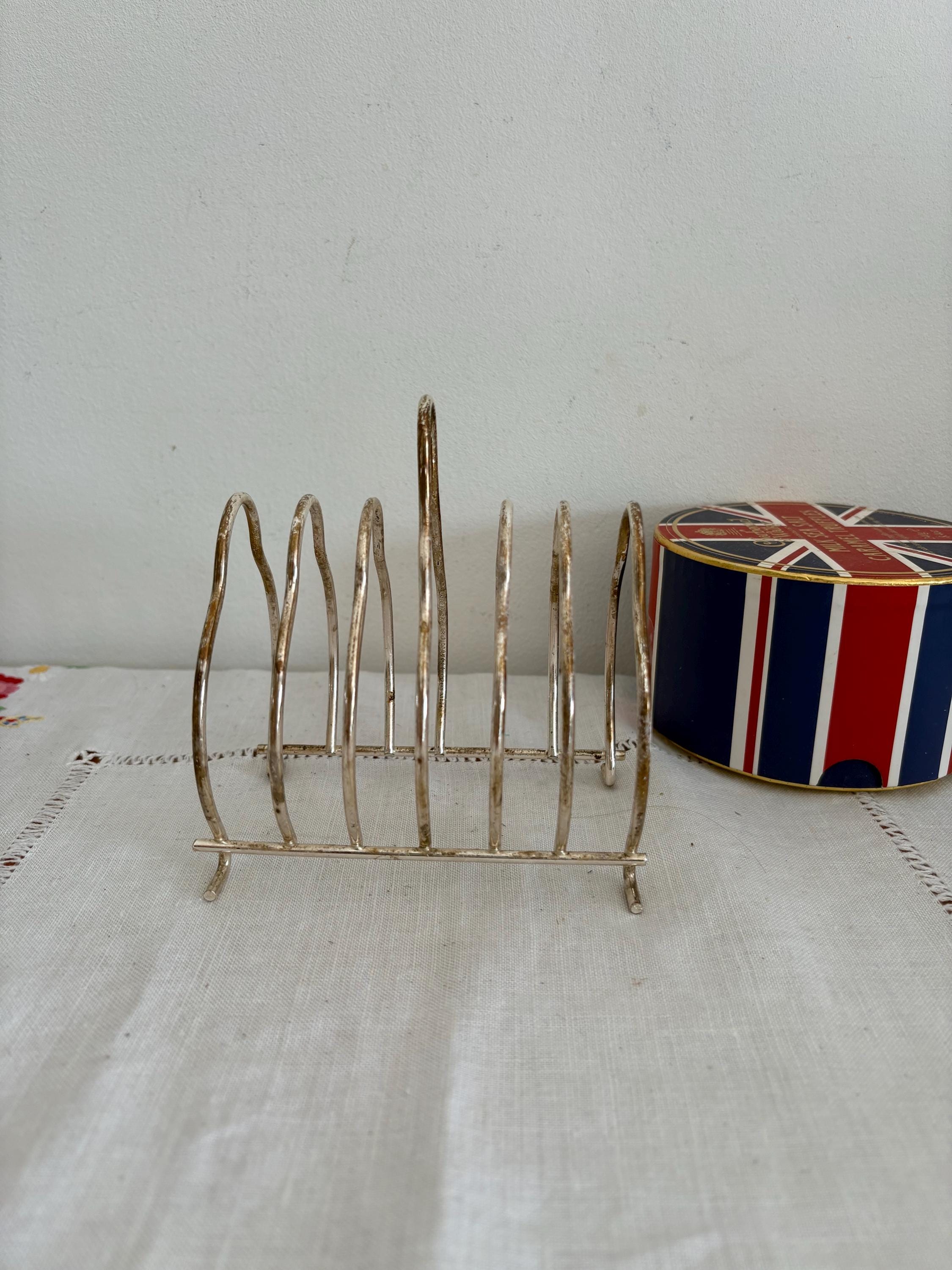 A classic silver plated  six slice  toast rack  to brighten up your breakfast table