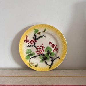An exquisite French vintage Orchies Moulin des Loups  hand painted wall hanging plate with yellow border and  red currant design