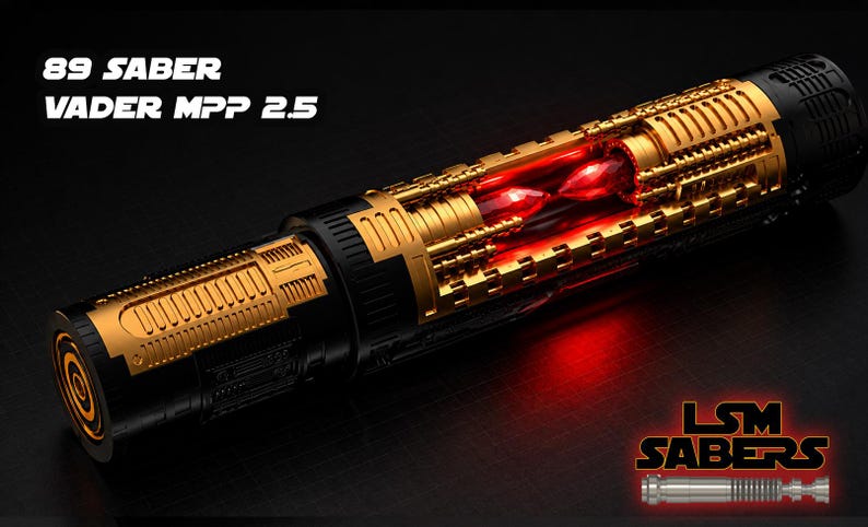May include: A detailed image of a lightsaber with gold and black accents. The lightsaber has a complex design with visible internal components and a glowing red core. The text "89 SABER VADER MPP 2.5" is displayed at the top.