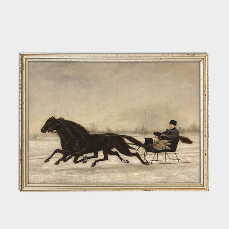 May include: An antique framed painting depicts a winter scene with two dark horses pulling a sleigh through a snowy landscape. A person in a hat and coat is seated in the sleigh. The painting has a gold-colored frame.