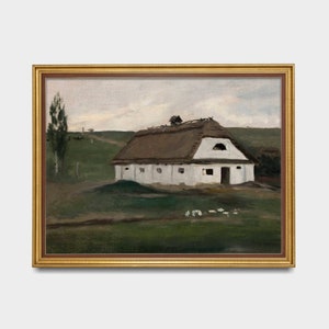 May include: An oil painting of a white farmhouse with a thatched roof, set in a green field under a cloudy sky. The artwork is framed in a gold-colored frame, adding a classic touch to the rural landscape scene.