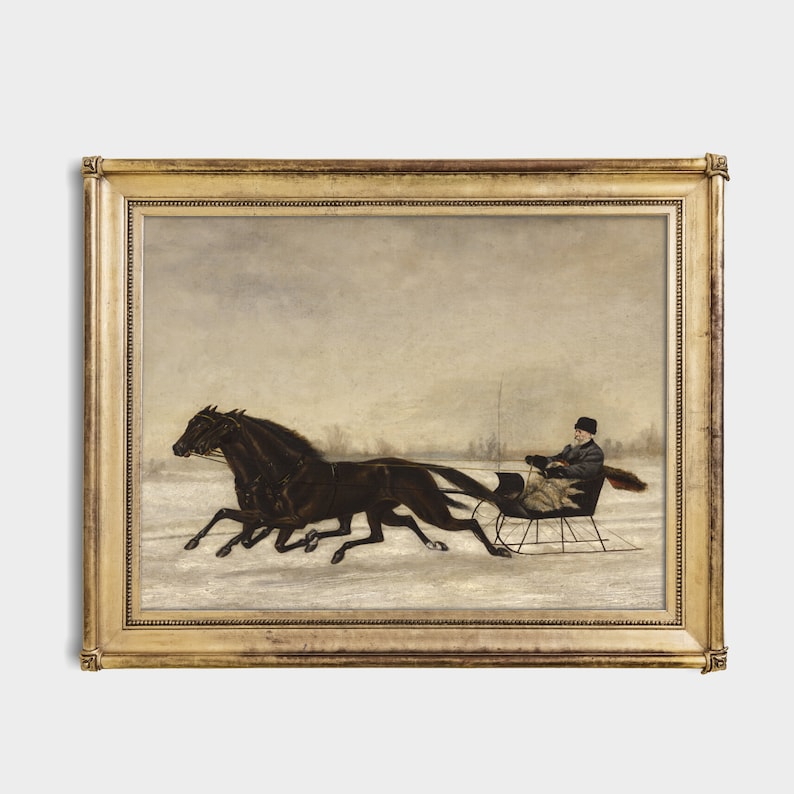 May include: An antique framed painting depicts a winter scene with two dark horses pulling a sleigh across a snowy landscape. A person is seated in the sleigh, wearing a hat and coat. The painting is framed in a gold-colored ornate frame.