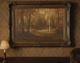 May include: A framed landscape painting depicting a forest scene with tall trees and a path. The painting is in a gold ornate frame. A small lamp with a beige shade sits on a wooden table below the painting.