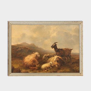 May include: A framed oil painting depicting a brown goat and four sheep in a grassy field. The goat is standing and looking to the left, while the sheep are lying down. The background is a hazy landscape with hills and clouds.
