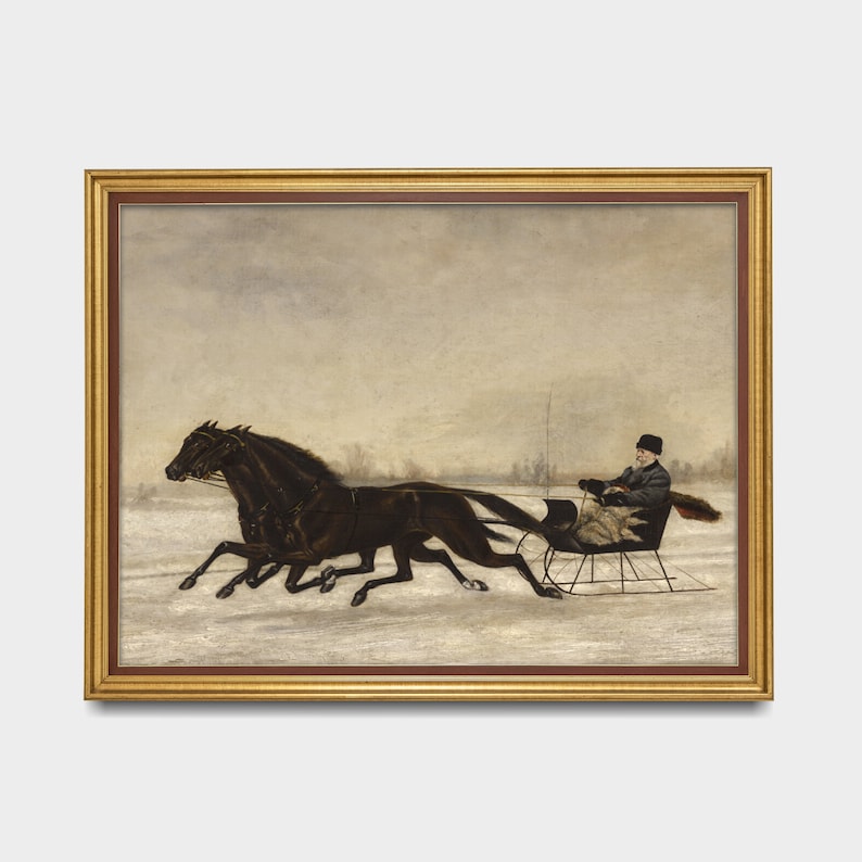 May include: A framed vintage painting depicts a winter scene with two dark horses pulling a sleigh across a snowy landscape. A person sits in the sleigh, bundled in warm clothing. The artwork is set in a gold-colored frame.
