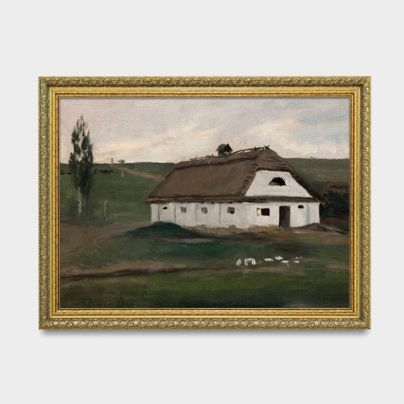 May include: An oil painting of a white building with a thatched roof, set in a green field under a cloudy sky. The artwork is framed in a gold ornate frame, adding a classic touch to the rural landscape scene.