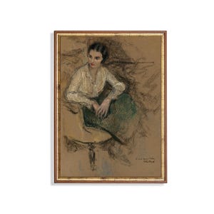 Può includere: Un disegno a pastello incorniciato di una donna con una blusa bianca e una gonna verde, seduta su una sedia. Il disegno è firmato "W. Mack" nell'angolo in basso a destra.