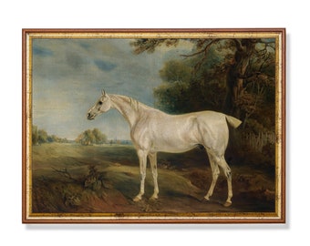 May include: An antique framed painting of a white horse in a field. The horse stands in profile, with a detailed depiction of its form. The painting has a brown and gold ornate frame, and the background shows a landscape with trees and a cloudy sky.