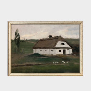 May include: An antique framed painting depicts a white farmhouse with a thatched roof set in a green field. A tall tree stands to the left, and a dirt path leads into the distance under a cloudy sky. The painting is in a gold-colored frame.