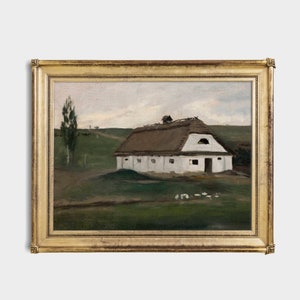 May include: An oil painting of a white cottage with a thatched roof, set in a green field under a cloudy sky. The artwork is framed in a gold-colored, ornate frame, adding a touch of elegance to the pastoral scene.