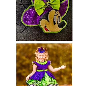 May include: A Halloween-themed ensemble featuring a Minnie Mouse-inspired headband with a purple glitter witch hat and a green bow. The image also shows a young girl in a purple and green witch-themed dress with a spiderweb design.