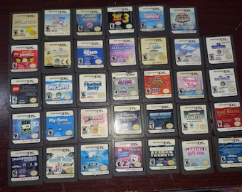 34 nintendo ds games lot mixes lego battle, toy story 3, club penguin, smurfs 2 , despicable me, spiderman 2, garfield, transformers