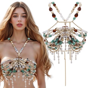 May include: A gold chain body jewellery piece with green, white and brown beads. The chain has a dangling design with multiple strands of beads.