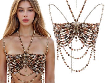 May include: A beaded top and necklace set. The top is made of various sized beads in shades of brown, tan, and cream. The necklace and straps are adorned with small star-shaped charms. The design is reminiscent of a seashell theme.