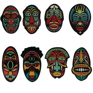 May include: Eight colorful tribal masks with intricate designs. The masks are made of fabric and have a variety of colors, including red, green, blue, yellow, and black.