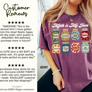May include: Purple t-shirt with the text "Math is My Jam" in a white retro font. The shirt features a graphic of nine jars of jam, each with a different math-related label, such as "Numbers", "Measurement", "Algebraic Thinking", "Geometry", "Operations", "Problem Solving", "Probability", and "Data Analysis".