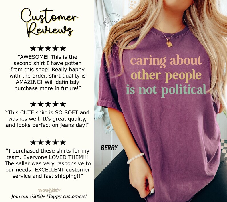 May include: A purple t-shirt with the text "caring about other people is not political" in colorful letters. The shirt is being worn by a person with a bracelet on their wrist. Customer reviews are shown on the left side of the image.
