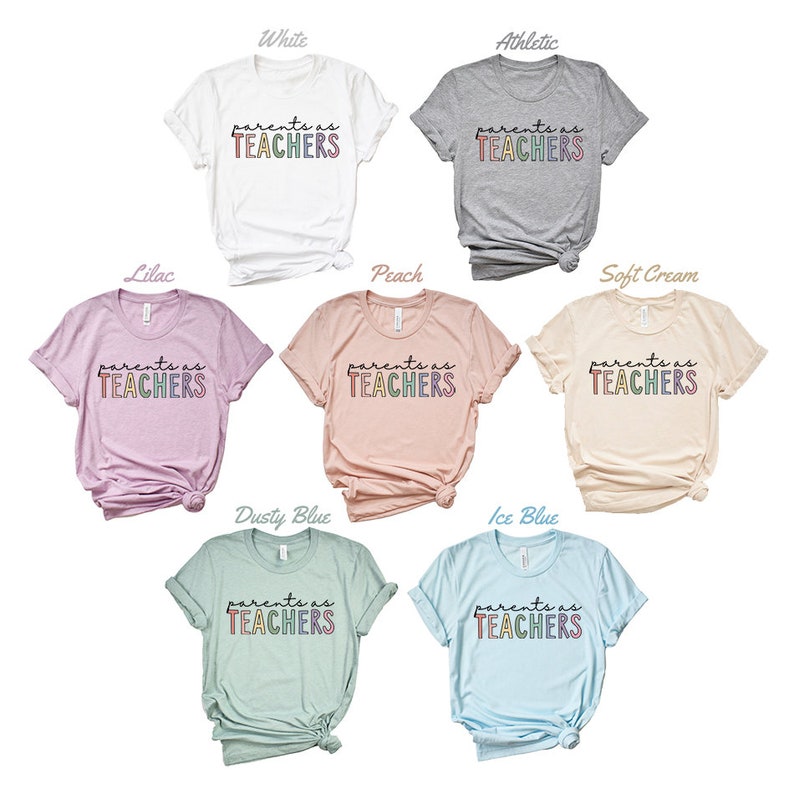 Puede incluir: Un conjunto de diez camisetas de diferentes colores, cada una con el texto "parents as TEACHERS" en letras arco&iacute;ris.