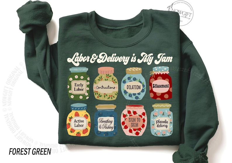 May include: Forest green sweatshirt with the text "Labor & Delivery is My Jam" printed in white. The text is surrounded by illustrations of jars with different stages of labor printed on them.