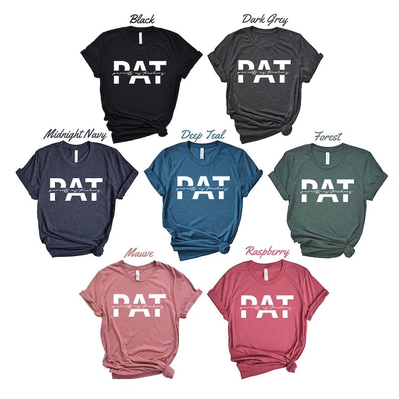 May include: A set of ten t-shirts in various colours, each featuring the text "PAT" with the words "parents are texting" written in smaller font underneath. The t-shirts are displayed against a white background.