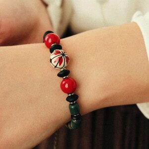 Red & Green Ceramic Beaded Bracelet, Hand-Painted Alatyr Symbol, Ukrainian Folk Jewelry