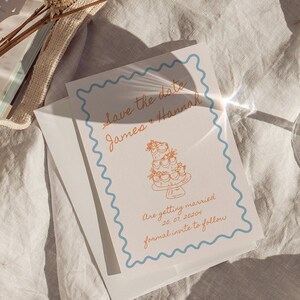 handwritten invite blue and orange