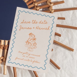 whimsical wedding invite blue and orange