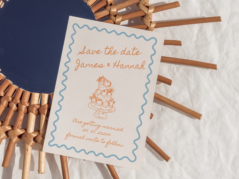 whimsical wedding invite blue and orange