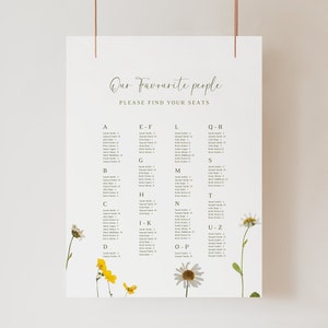Tafelschikking met wilde bloemen geperste bloemen tafelschikking voor bruiloft alfabetische tafelschikking tafelschikking Canva tafelschikking geperste bloemen