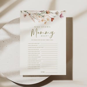 Preguntas frecuentes sobre "Quién conoce a mamá" de Wildflower. Plantilla de juego para baby shower "Quién conoce a mamá" de Baby In Bloom. Tema imprimible de Baby In Bloom.